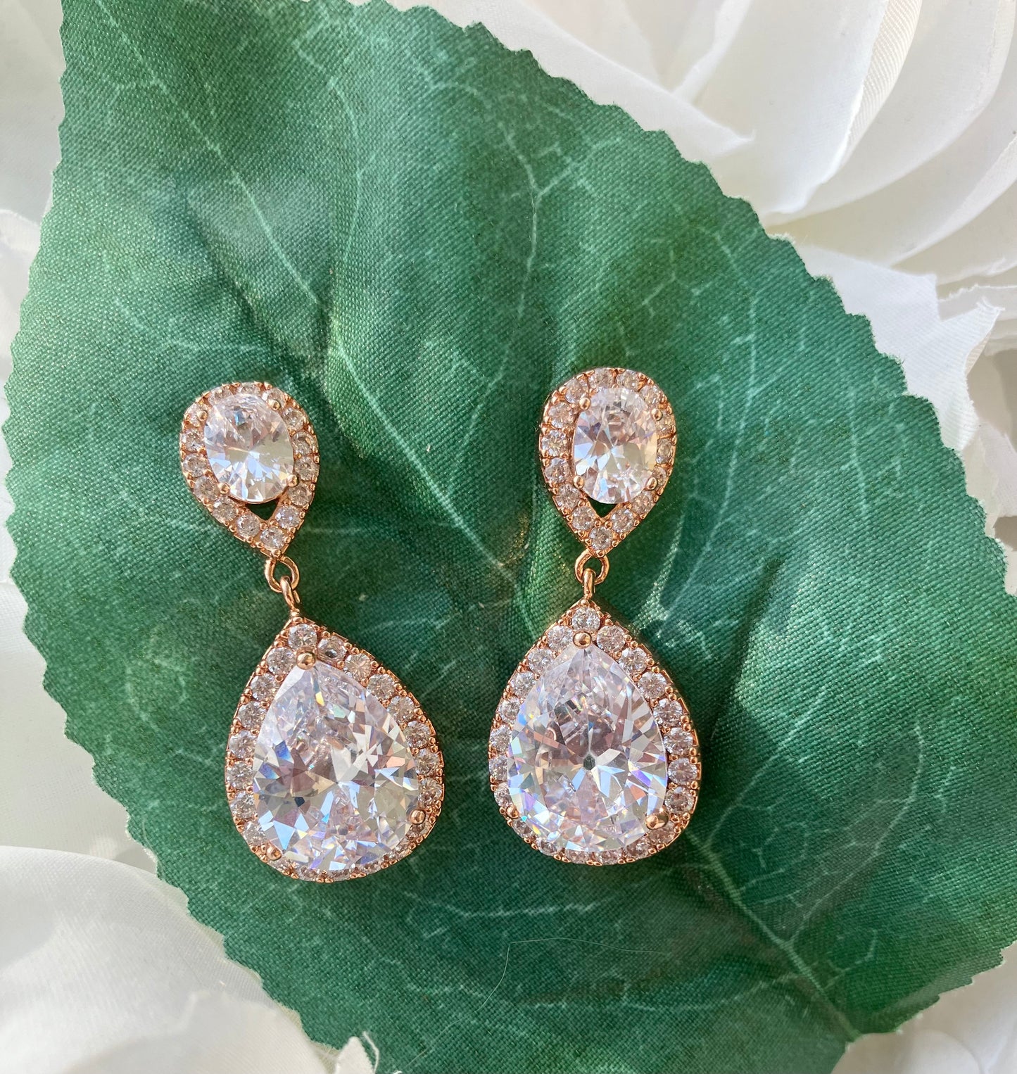 Rose Toned Halo Dangle CZ Earrings