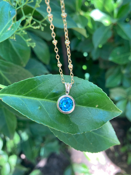 Yellow Gold Blue Topaz Necklace