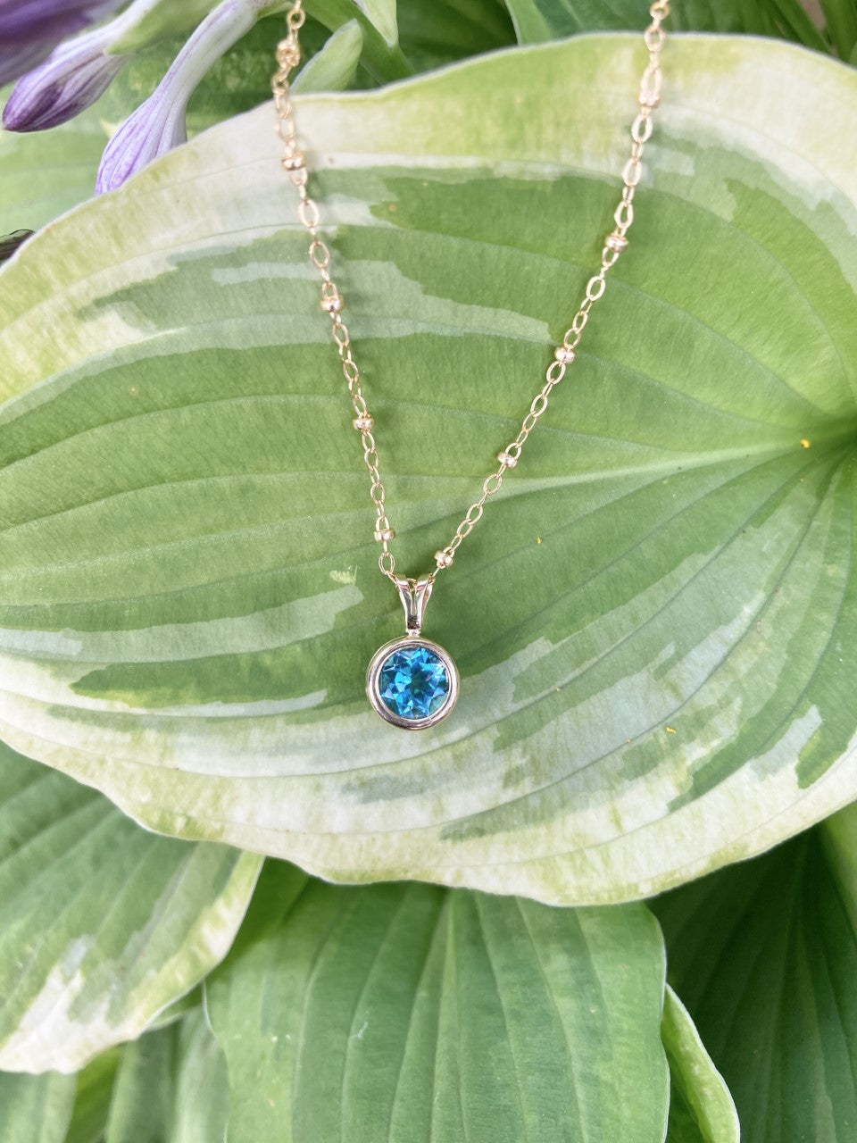 Yellow Gold Blue Topaz Necklace